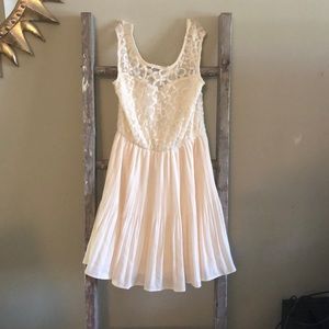 Cream, lace and pleated dress